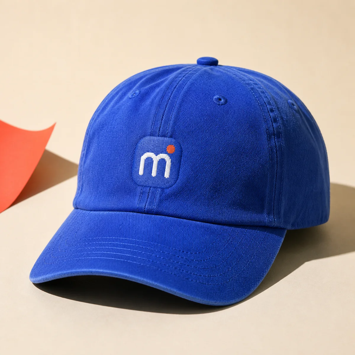 Micro Goods cobalt cap with an embroidered Micro mark